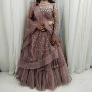 Stylish Peach Color Soft Net Ruffle Lehenga Choli
