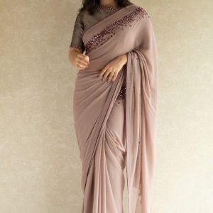 Radiant Light Peach Colour Georgette Saree