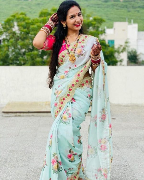 excellent Turquoise Woven Checks Poly Silk Saree
