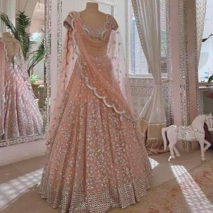 Trendy Opulent Peach Color Titli Sequin Work Lehenga Choli