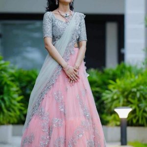 Functional wear Silver and Pink Colored Embroidered Net With Silk Lehenga Choli