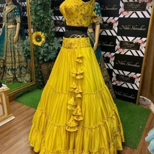 Gleaming Eye catching Yellow Colour Jacket Lehenga Choli Collection