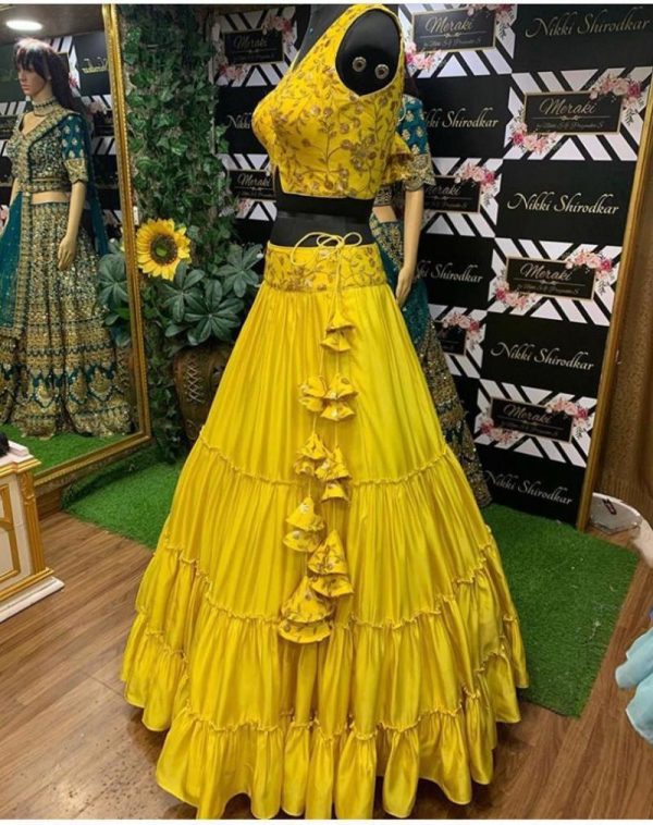 Gleaming Eye catching Yellow Colour Jacket Lehenga Choli Collection